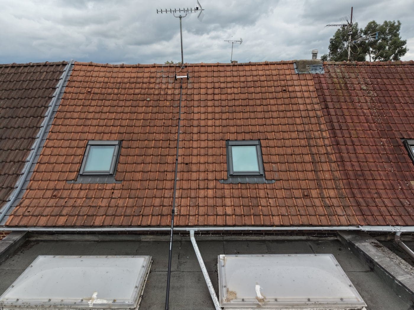 Toiture traitée depuis le sol chez un client
